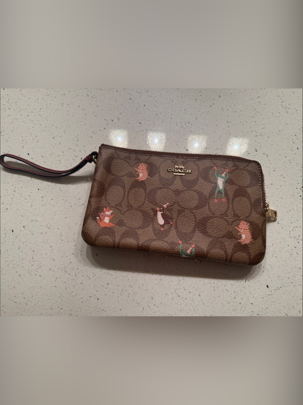 Coach Brown Signature Canvas Wristlet with Party Animal Motifs